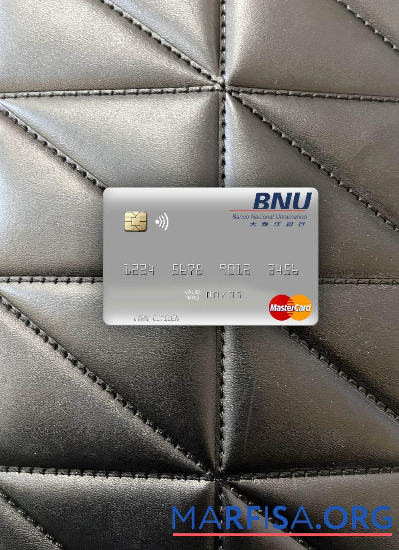 Downloadable Timor Leste Banco Nacional Ultramarino building mastercard photolook front sample